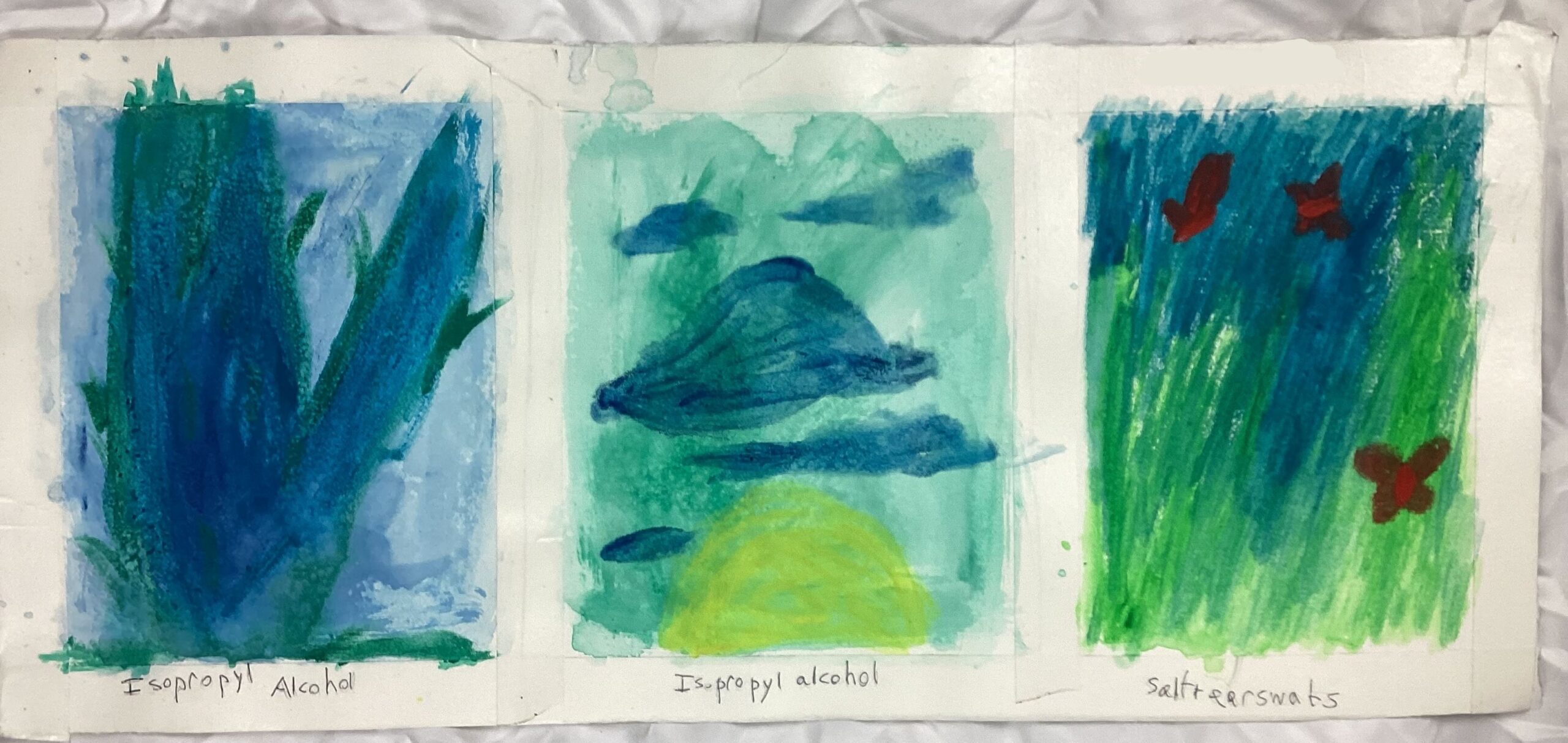 1: A torn piece of paper that is trisected into 3 “frames” by masking tape. The leftmost painting has a plant’s stem / branches against a blue background. The plant itself has leaves of some sort and is painted a combination of green and blue. Its center is more blue while its edges are more green. The center image depicts a yellow sun and blue clouds in a green sky. The rightmost image is that of grass and red butterflies with a blue sky.